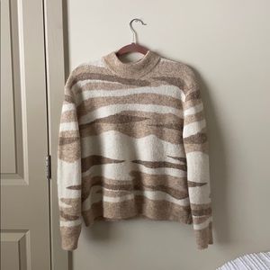 NEUTRAL HIGH NECK SWEATER WITH CAMO DETAIL